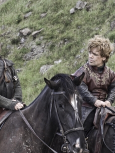 Tyrion leaves the Vale with Bronn after winning his freedom (Jerome Flynn, Peter Dinklage) in “Game of Thrones,” 2011