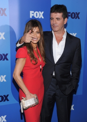 Paula Abdul and Simon Cowell have some fun at the 2011 Fox Upfronts at Wollman Rink - Central Park in New York City on May 16, 2011 