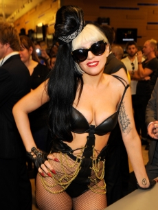 Lady Gaga signs copies of her album “Born This Way” at Best Buy in New York City on May 23, 2011 