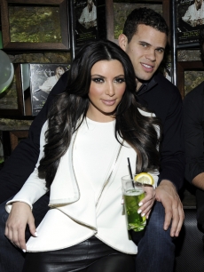 Kim Kardashian and Kris Humphries cuddle up at the Onitsuka Tiger And RCA Records Present The Release Of Avril Lavigne’s “Goodbye Lullaby” at SL in New York City on March 8, 2011 