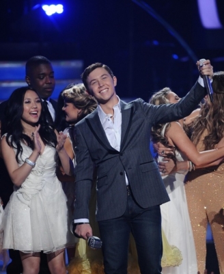 Scotty McCreery celebrates after being crowned the Season 10 winner on “American Idol’s” Grand Finale at the Nokia Theatre, Los Angeles, May 25, 2011
