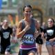 Pippa Middleton approaches the finish line during the GE Blenheim Triathlon at Blenheim Palace in Woodstock, England, on June 4, 2011 