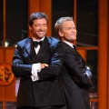 Hugh Jackman and Neil Patrick Harris perform on stage during the 65th Annual Tony Awards at the Beacon Theatre in New York City on June 12, 2011 