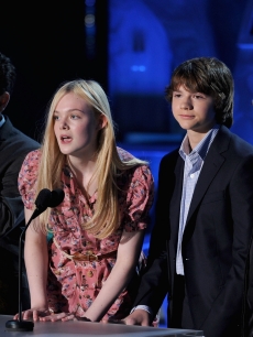 J.J. Abrams, Elle Fanning, Joel Courtney, and Steven Spielberg onstage during the 2011 MTV Movie Awards at Universal Studios’ Gibson Amphitheatre in Universal City, Calif. on June 5, 2011