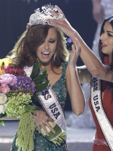 Alyssa Campanella, Miss California, is crowned as the 2011 Miss USA by Miss USA 2010 Rima Fakih in Las Vegas on June 19, 2011
