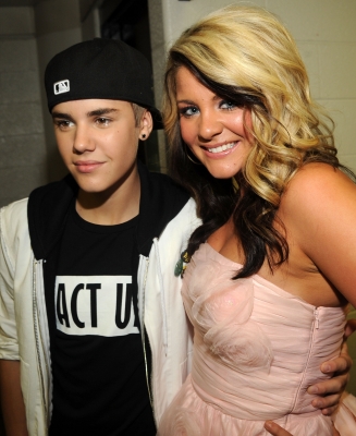 Justin Bieber and “Idol’s” Lauren Alaina pose backstage at the 2011 CMT Music Awards at the Bridgestone Arena, Nashville, on June 8, 2011
