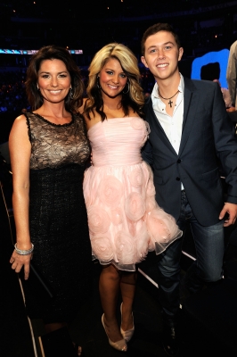 Shania Twain, Lauren Alaina, and Scotty McCreery pose backstage at the 2011 CMT Music Awards at the Bridgestone Arena, Nashville, on June 8, 2011