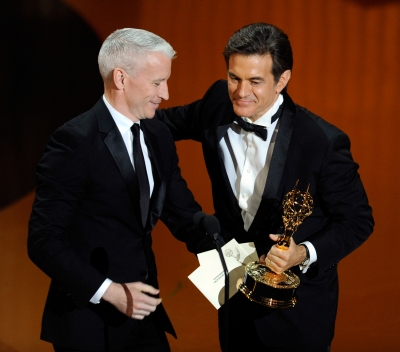 Dr. Mehmet Oz accepts the Outstanding Talk Show Host award from journalist Anderson Cooper onstage during the 38th Annual Daytime Entertainment Emmy Awards held at the Las Vegas Hilton in Las Vegas on June 19, 2011 