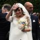 Lily Allen flashes a smile at her wedding to Sam Cooper at St James the Great church in Cranham, Gloucestershire, England, on June 11, 2011 
