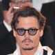 Johnny Depp departs the “Pirates of the Caribbean: On Stranger Tides” premiere during the 64th Annual Cannes Film Festival at Palais des Festivals on May 14, 2011 in Cannes, France