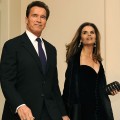Arnold Schwarzenegger and wife Maria Shriver arrive for a black-tie dinner at the White House on February 22, 2009 in Washington, DC