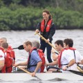 Prince William, Duke of Cambridge and Catherine, Duchess of Cambridge row dragon boats across Dalvay lake, Charlotte Town, Canada, on July 4, 2011