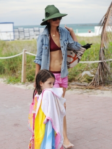 Katie Holmes (R) and Suri Cruise are sighted on South Beach on June 18, 2011 in Miami Beach, Fla.