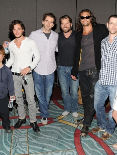 Lena Headey, Peter Dinklage and Kit Harington, writer David Benioff, actors Nikolaj Coster-Waldau and Jason Momoa, writer/producer D.B. Weiss and actress Emilia Clarke pose at HBO’s “Game Of Thrones” panel during Comic-Con 2011 on July 21, 2011 in San Diego