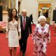 Queen Elizabeth II walks with Catherine, Duchess of Cambridge as they view the exhibitions for the summer opening of Buckingham Palace on in London on July 22, 2011