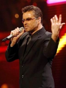No more screen print baggy white tees for George Michael