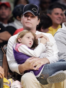 Ray Liotta and daughter Karsen take in the game too