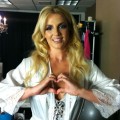 Britney Spears seen making a heart shape for the “Show Your Hearts” campaign, July 2011