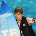 Justin Bieber accepts the Choice Male Artist award onstage during the 2011 Teen Choice Awards held at the Gibson Amphitheatre in Universal City, Calif. on August 7, 2011 