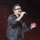 Bono rocks out during a U2 concert in New York City on July 20, 2011