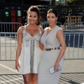 Demi Lovato and Kim Kardashian look stunning in white at the 2011 VH1 Do Something Awards at the Hollywood Palladium in Hollywood, Calif. on August 14, 2011 