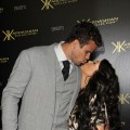 Kris Humphries and Kim Kardashian share a kiss on the red carpet of the Kardashian Kollection Launch Party in Hollywood, Calif.on August 17, 2011