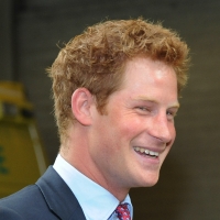 Prince Harry visits Salford Ambulance Headquarters to meet ambulance crew members who were on duty during last week’s riots in Salford, England on August 18, 2011