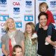 Jennie Garth and Peter Facinellie pose with their daughters at a recent event
