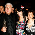 Amy Winehouse, her father Mitch and mother Janis pose with Amy’s award for Best Song Musically and Lyrically for ‘Love Is A Losing Game’ at the 53rd Ivor Novello Awards at the Grosvenor House Hotel, London, on May 22, 2008 