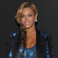 Beyonce smiles at the launch of her fragrance in New York City on September 21, 2011