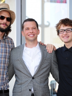 Honoree Jon Cryer poses with ‘Two and a Half Men’ co-stars Aston Kutcher and Angus T. Jones at his star presentation ceremony on the Hollywood Walk of Fame, September 19, 2011