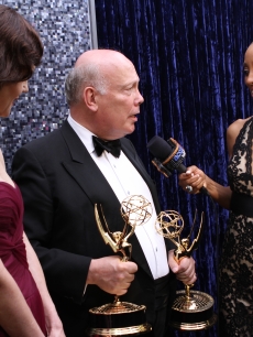 Access Hollywood’s Shaun Robinson interviews ‘Downtown Abbey’s’ Julian Fellowes after his win for Outstanding Writing for a miniseries backstage at the 63rd Annual Emmy Awards in Los Angeles on September 18, 2011