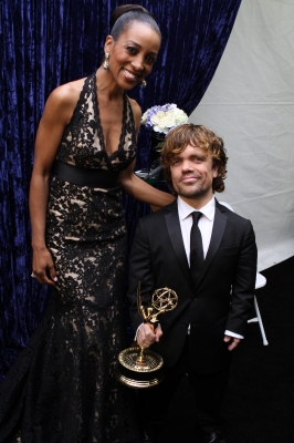 Access Hollywood’s Shaun Robinson poses with ‘Game of Thrones’ Outstanding Supporting Actor Peter Dinklage backstage at the 63rd Annual Emmy Awards in Los Angeles on September 18, 2011