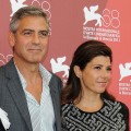 George Clooney and Marisa Tomei attend the ‘The Ides of March’ photocall during the 68th Venice International Film Festival at Palazzo del Casino in Venice on August 31, 2011