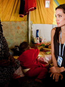 United Nations Goodwill Ambassador Angelina Jolie visits Somali refugees at Shousha Camp, near the Tunis-Libyan border in Ras Djir, Tunisia, on April 5, 2011

