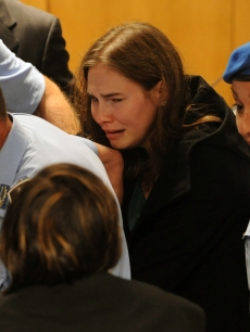 Amanda Knox reacts at the announce of the verdict of her appeal trial in the Meredith Kercher’ murder, Perugia, Italy, on October 3, 2011