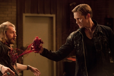 Eric Northman (Alexander Skarsgard) tears a witch’s heart out on “True Blood,” Season 4