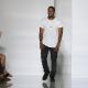 Kanye West acknowledges the applause of the audience after the KW by Kanye West Ready to Wear Spring / Summer 2012 show during Paris Fashion Week at Lycee Henri IV in Paris on October 1, 2011 