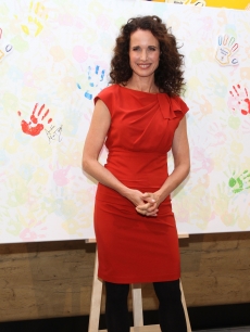 Andie MacDowell attends a photocall to celebrate McDonalds-Germany’s up-and-coming 40th Birthday and to support their ‘Helping Hand’ charity in their restaurant at Checkpoint-Charlie in Berlin, Germany, on October 14, 2011 