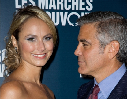 Stacy Keibler and George Clooney exchange a smile at ‘The Ides of March’ Paris Premiere at Cinema UGC Normandie in Paris, France, on October 18, 2011 