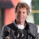 Jon Bon Jovi is seen giving a speech at the grand opening celebration of The Soul Kitchen in Red Bank, New Jersey on October 19, 2011     