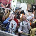 Passionate Michael Jackson fans line the streets outside of the Los Angeles Superior Courthouse awaiting a verdict in Downtown Los Angeles on November 7, 2011
