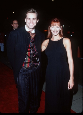 Jim Carrey & Lauren Holly at the premiere of ‘Dumb and Dumber,’ at Cinerama Dome Theater in Hollywood, Dec. 6, 1994