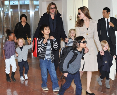 Brad Pitt, Angelina Jolie and their six children Maddox, Pax, Zahara, Shiloh, Knox, and Vivienne arrive at Haneda International Airport in Tokyo on November 8, 2011