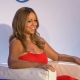 Mariah Carey flashes a smile at a press conference to announce that she is the new Jenny Craig Brand Ambassador at Four Seasons Hotel New York on November 9, 2011
