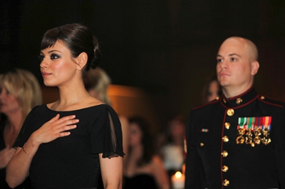 Mila Kunis with Sgt. Scott Moore at the Marine Corps Ball in Greenville, N.C.
