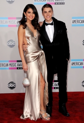Selena Gomez and Justin Bieber steps out at the 2011 American Music Awards held at Nokia Theatre L.A. Live in Los Angeles on November 20, 2011 