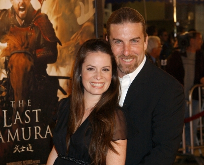 Holly Marie Combs and David Donoho pose at ‘The Last Samurai’ premiere in Los Angeles on December 1, 2003