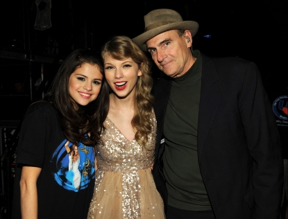 Selena Gomez, Taylor Swift and James Taylor pose during the ‘Speak Now World Tour’ at Madison Square Garden in New York City on November 22, 2011 