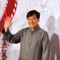 Jackie Chan waves to fans at a TV Channel charity event  in Beijing, China, on December 17, 2011